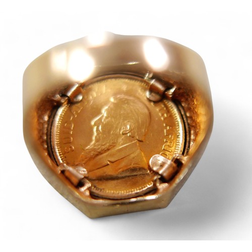 84 - A 1/10oz Krugerrand inset ring, with 9ct gold band, size M, 8.9g.