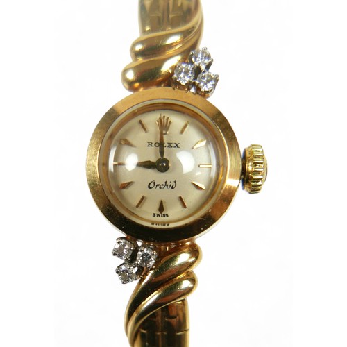 114 - An 18ct gold and diamond set Rolex Orchid lady's cocktail wristwatch, the shaped bracelet set with s... 