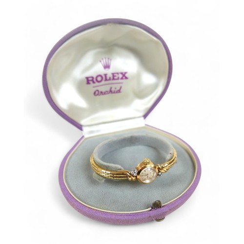 114 - An 18ct gold and diamond set Rolex Orchid lady's cocktail wristwatch, the shaped bracelet set with s... 