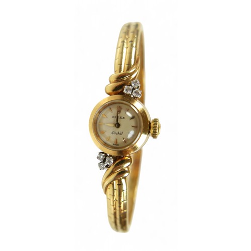 114 - An 18ct gold and diamond set Rolex Orchid lady's cocktail wristwatch, the shaped bracelet set with s... 