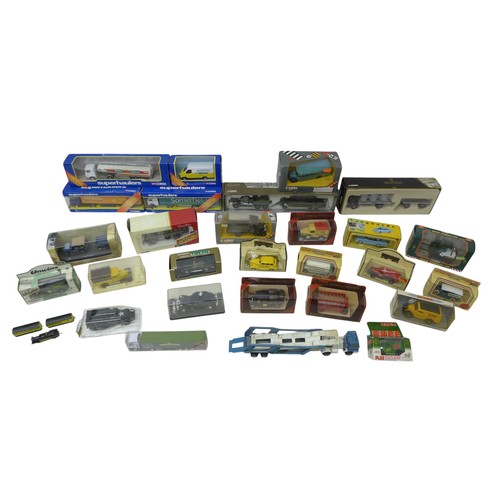 234 - A collection of twenty nine die cast vehicles, all boxed except one. (29)