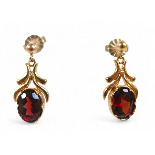 55 - Two pairs of 9ct gold and garnet earrings, flower head and drop design, total weight 5.4g.