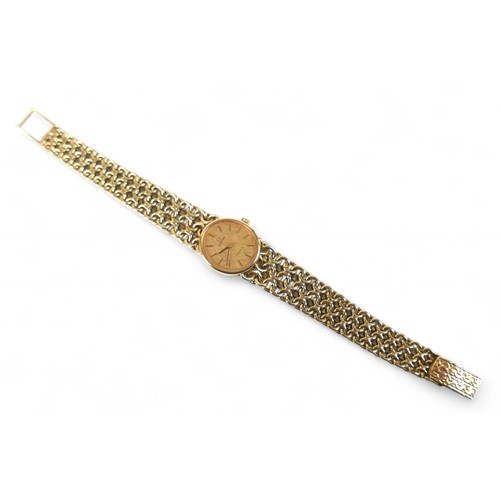 110 - A 9ct gold Omega Geneve lady's wristwatch, with 9ct gold fancy link bracelet strap, 20mm case, with ... 