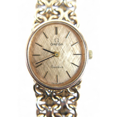 110 - A 9ct gold Omega Geneve lady's wristwatch, with 9ct gold fancy link bracelet strap, 20mm case, with ... 