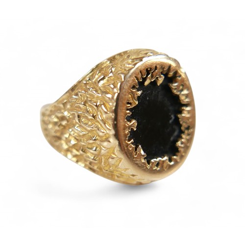 66 - Two 9ct gold rings, comprising a gold and garnet ladies dress ring, the garnet approximately 18 by 1... 