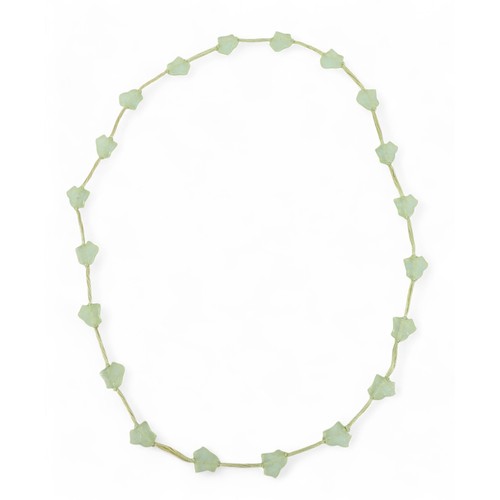 77 - A Lalique 'Feuilles de Lierre' necklace, with twenty glass beads on silk thread, necklace 58cm long.