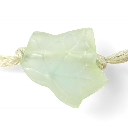 77 - A Lalique 'Feuilles de Lierre' necklace, with twenty glass beads on silk thread, necklace 58cm long.