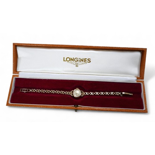 99 - A Longines 9ct gold lady's cocktail watch, with presentation inscription verso, 9ct gold case and br... 