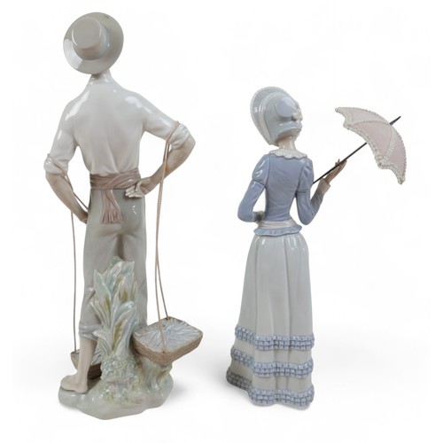 156 - Two large Lladro figurines, comprising Fisherman, 4802, 38.5cm high, together with Aranjuez Lady, 48... 