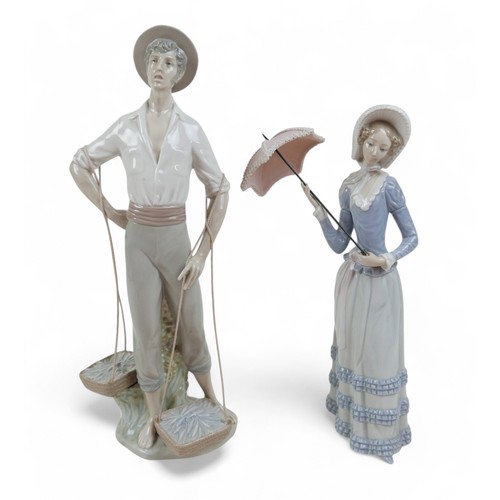 156 - Two large Lladro figurines, comprising Fisherman, 4802, 38.5cm high, together with Aranjuez Lady, 48... 