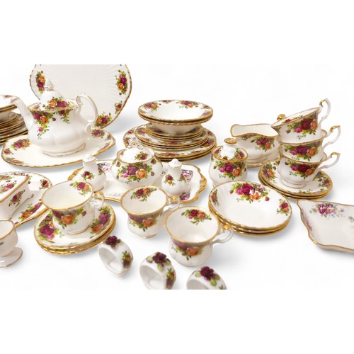 193 - A Royal Albert part dinner and tea service, decorated in the 'Old Country Roses' pattern, seventy-ni... 