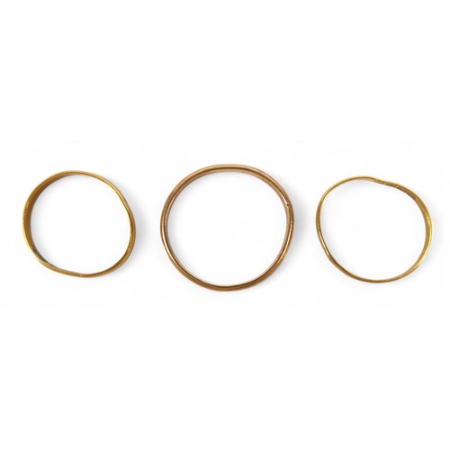 40 - Two gold band rings and a plated band ring, gold rings surface test to approximately 22ct, gold weig... 