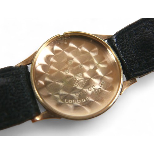 107 - A 9ct yellow gold Enicar Ultrasonic wristwatch, manual wind 23 jewel movement, 29mm case on leather ... 