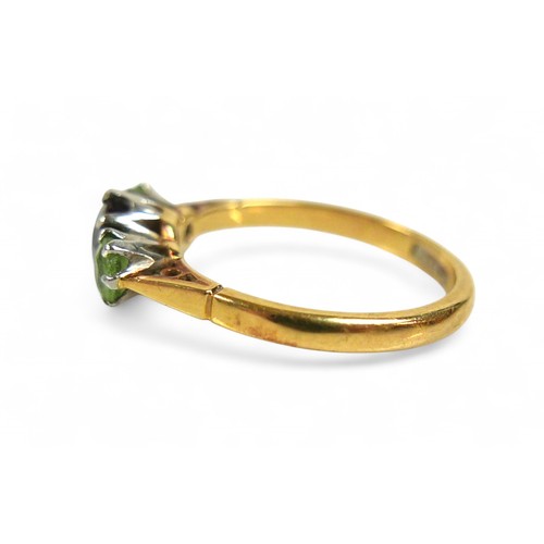 47 - An 18ct yellow gold three stone ring, size N, weight 3.2g.