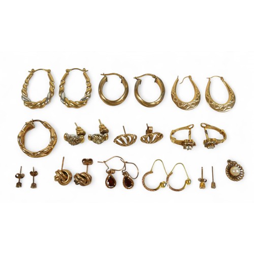 64 - A collection of gold and gilt metal earrings, total weight 21.0g. (1 bag)