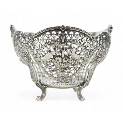 11 - A German/Prussian silver fretwork basket, with bird and flower decoration, marked 800, maker Storck ... 