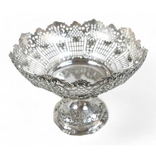 6 - A German / Prussian silver fretwork centrepiece, with rose decoration, marked 800 POSEN, 22 by 19cm ... 