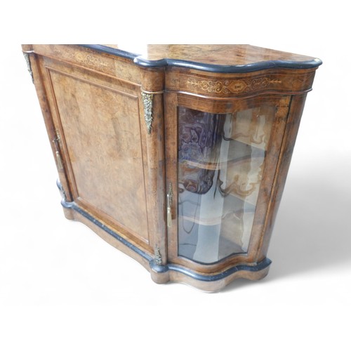 374 - A Victorian inlaid burr walnut credenza/side cabinet, with a shaped top, central door flanked by ser... 