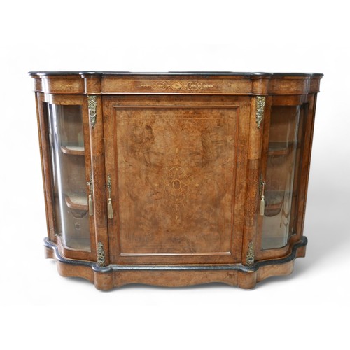 374 - A Victorian inlaid burr walnut credenza/side cabinet, with a shaped top, central door flanked by ser... 