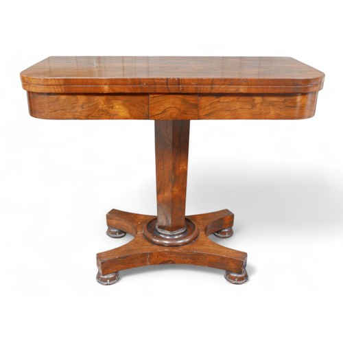 359 - A 19th century rosewood folder top card table, on a tapering octagonal column and platform base with... 