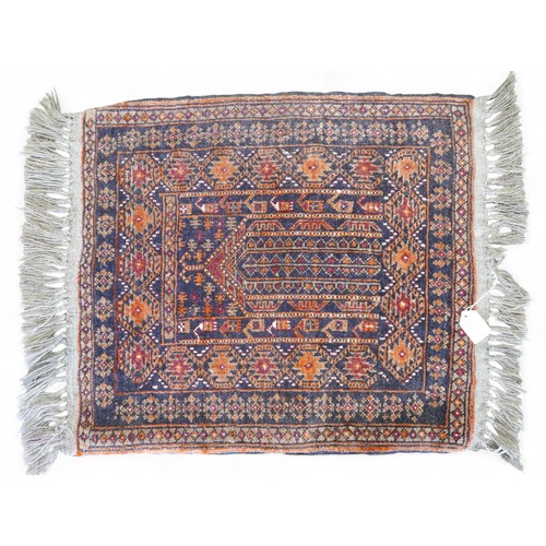 336 - A collection of four small hand knotted rugs, largest 52 by 80cm. (4)