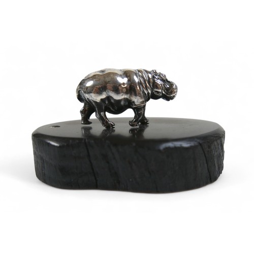 18 - Patrick Mavros: small model of a silver hippo on wooden base, boxed with certificate.