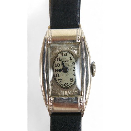 97A - A silver cased Buren wrist watch with oval dial, leather strap, plus a boxed Chairman Mao Shanghai T... 