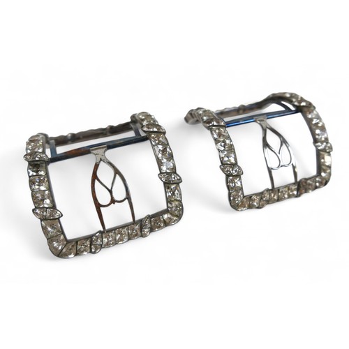 41 - A fine pair of Georgian steel and paste set shoe buckles, set with black dot paste in gadrooned styl... 