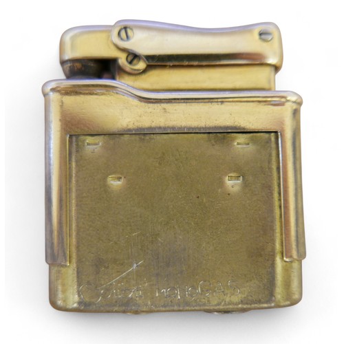 87 - A 9ct gold cased Colibri Monogas lighter, with engine turned decoration, 72.4g gross weight, 9ct gol... 