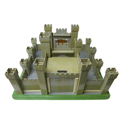 232 - A vintage toy castle, mid 20th century, with shaped and painted wooden pieces slotting together onto... 