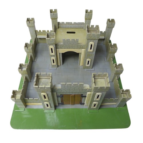 232 - A vintage toy castle, mid 20th century, with shaped and painted wooden pieces slotting together onto... 