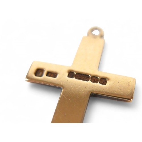 34 - A 9ct yellow gold cross shaped pendant, 3.4cm high, 2.6g.