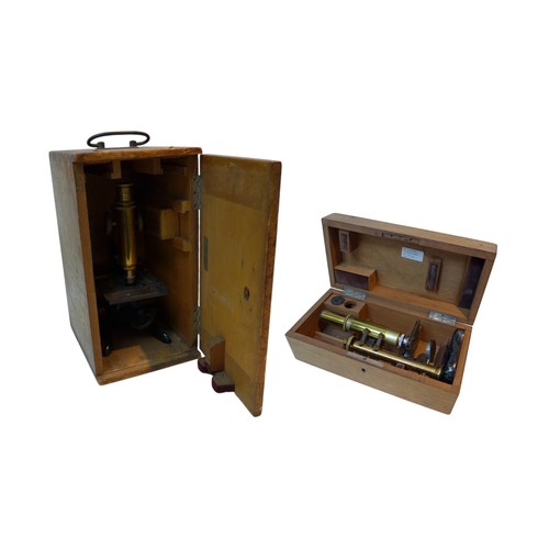 224 - E. Leitz Wetzlar brass microscopes in original wooden cases c.1900, both boxes are numbered and matc... 