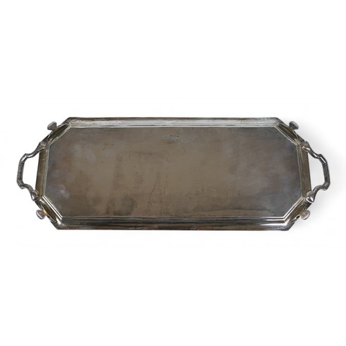 16 - An Art Deco silver tray, of oblong form with two handles, Atkin Brothers, Sheffield 1951, 20.0toz, 4... 