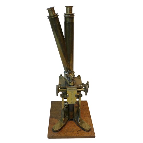 225 - A large Victorian John Browning brass binocular microscope, in wooden box, together with a smaller b... 