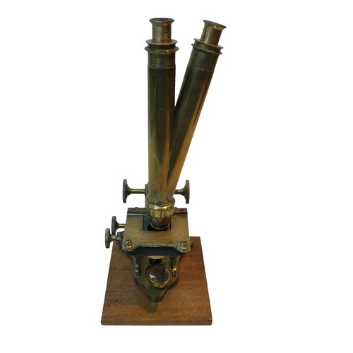 225 - A large Victorian John Browning brass binocular microscope, in wooden box, together with a smaller b... 