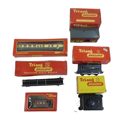 233 - A collection of Hornby Tri-Ang model railway, with boxed loco and rolling stock, some accessories an... 