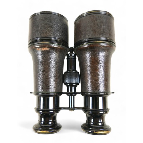 220 - A group of four pairs of binoculars, including a French WWI pair made by Lemaire, Paris, in leather ... 