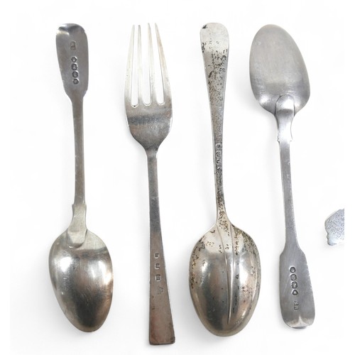 28 - A group of assorted silver flatware, mostly spoons, including a set of eight continental apostle spo... 