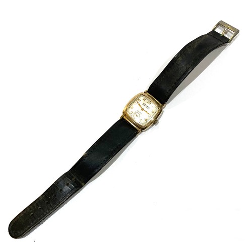 93A - A Gruen Veri-Thin Precision gold plated wristwatch, circa 1940, with rounded rectangular silvered di... 