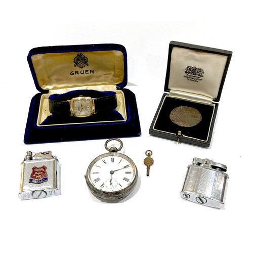 93A - A Gruen Veri-Thin Precision gold plated wristwatch, circa 1940, with rounded rectangular silvered di... 