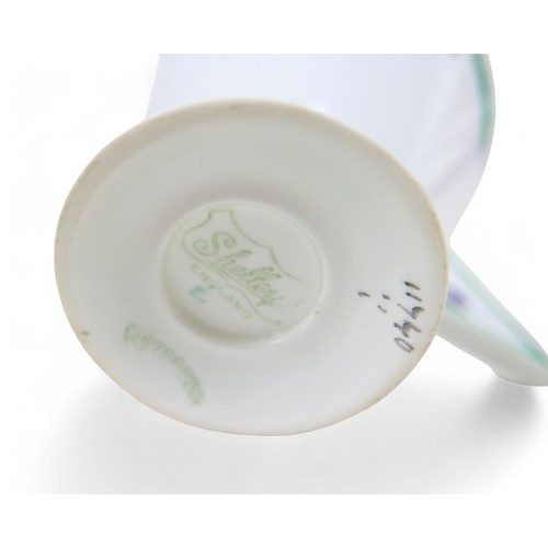 189A - An Art Deco Shelley tete-a-tete tea set, decorated in the 'Vogue 'J' Green' pattern, green printed f... 