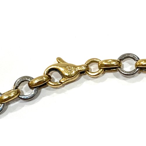 73A - A yellow gold and platinum equestrian theme bracelet, with links in the shape of stirrups, spurs, an... 