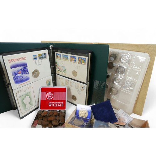 9 - A collection of world coins, in five albums and loose dating from George III. (1 box)