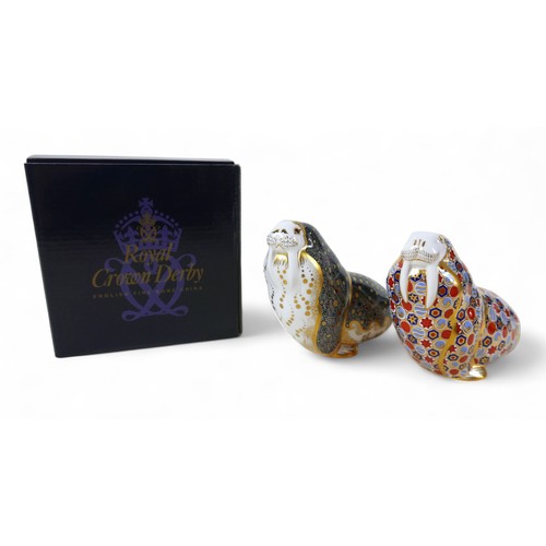 186 - Two Royal Crown Derby paperweights, modelled as 'Russian Walrus', with gold stopper, boxed, and anot... 