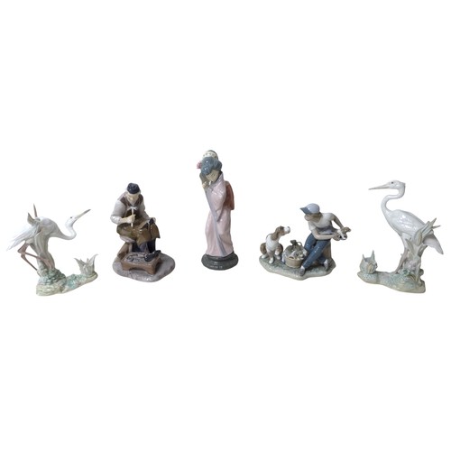 182 - A pair of Lladro heron candlesticks, a Copenhagen B&G figure and two further Lladro figures. (5)