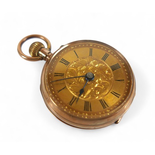 111 - A 9ct yellow gold open faced pocket watch, top wind with 26mm case, base metal dust cover, weight 6.... 