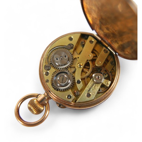 111 - A 9ct yellow gold open faced pocket watch, top wind with 26mm case, base metal dust cover, weight 6.... 