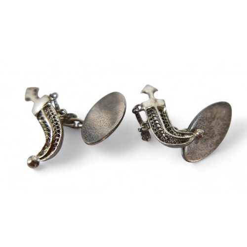 60 - Three pairs of white metal cufflinks and three base metal fobs. (6)