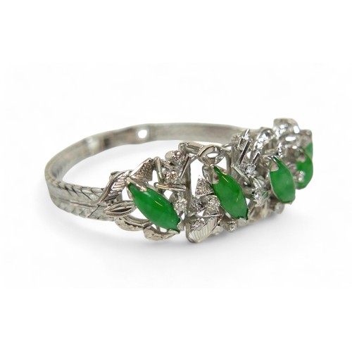 100 - A jade, 18k white gold and diamond bracelet, set in the 1960's, the spray design with five marquise-... 